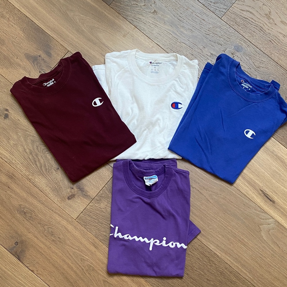 4 Champion Tees in purple, maroon, white and royal blue. Size S